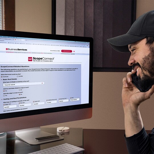 Man on computer looking at ScopeConnect