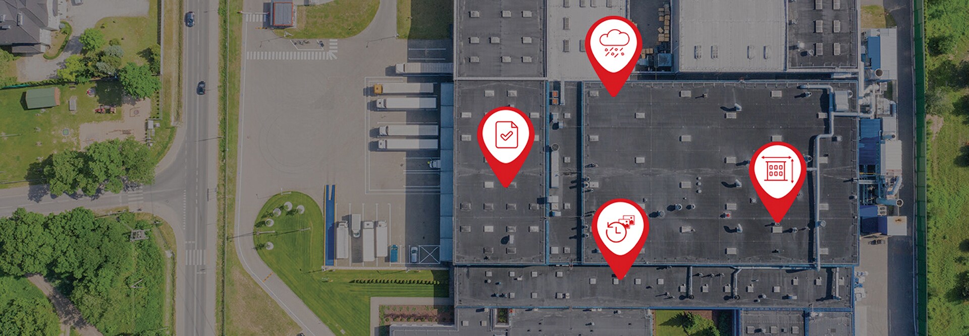 Aerial view of commercial roof with property profile report data from GAF QuickSite